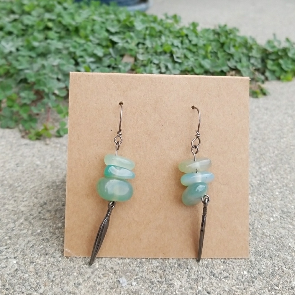 Green stone and feather earrings